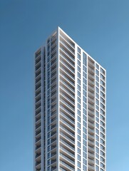Fototapeta premium Photo of a modern white high-rise building against a bright, clear blue sky