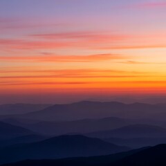 Obraz premium Vibrant mountain range at sunset