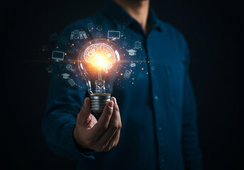 Innovative idea concept with glowing brain inside lightbulb held by person, modern business