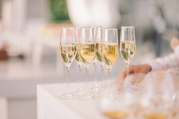 Celebration filled with sparkling drinks on a bright white table in a classy setting during a joyful gathering for friends