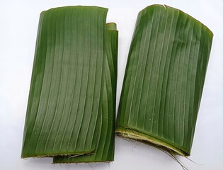 Folds of fresh banana leaves