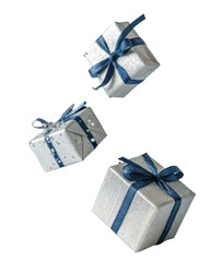 Silver gift boxes with blue ribbons create festive atmosphere, perfect for celebrations and special occasions