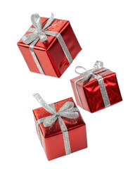 Obraz premium Bright red gift boxes with silver ribbons create festive atmosphere, perfect for celebrations and special occasions