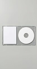 blank cd dvd case, Open clear plastic CD jewel case with blank white disc and insert for branding. Mock-up of compact disc packaging on soft gray background. Represents digital storage, music or softw