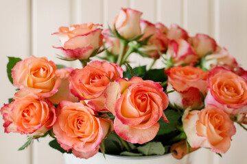 Big bouquet of peach roses.