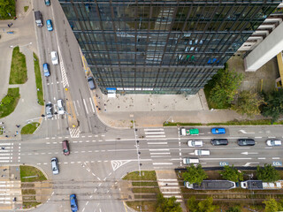 Aerial view of city roads and trams, intersection in Wroclaw