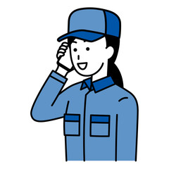 スマートフォンで話すつなぎ作業服の女性