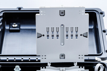 Close up of fiber optic splice closure box for telecommunication cable management and network distribution