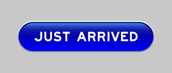 Fototapeta premium Blue color capsule shape button with word just arrived on gray background