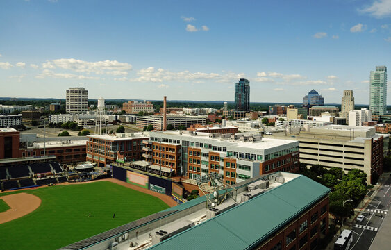 View of the downtown Durham North Carolina skyline with a mix of new and historic buildings
