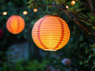 Fototapeta premium Vibrant Lanterns Illuminating a Lush Outdoor Garden Space at Night