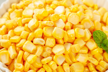 Fresh Golden Corn Kernels with Mint Leaf - Healthy Vegetable Food Background