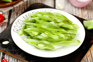 Fresh Green Snap Peas Vegetable Dish on White Plate - Healthy Organic Food