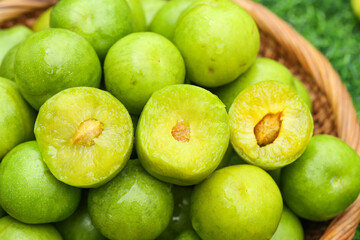 Fresh Green Plums in Wooden Basket - Crisp Sichuan Stone Fruit with Exposed Pulp