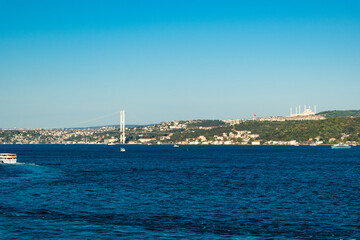 Istanbul, Turkey. View of the Bosporus Strait and Bosphorus Bridge. Beautiful city view The Grand Chamlija mosque in the background