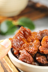 Gaozhou Dried Lychee Specialty - Traditional Chinese Preserved Fruit with Thick Flesh in Ceramic Bowl