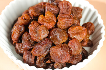 Dried Lychee Fruits from Fujian China in White Bowl - Sweet Asian Tropical Fruit Snack