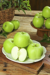 Fresh Green Apples from Shaanxi Province Ready to Pick - Tree-Ripened Organic Fruit on Rustic Wooden Table