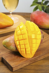 Fresh Cut Mango Fruit Diced on Wooden Board Ready to Serve