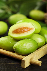 Fresh Green Olives in Bamboo Basket - Traditional Mediterranean Food Ingredient