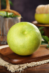 Fresh Green Pomelo Citrus Fruit on Wooden Board - Healthy Organic Produce for Cooking and Nutrition