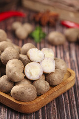 Fresh Raw Potatoes on Wooden Board - Organic Vegetables for Healthy Cooking