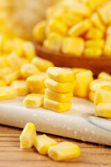Fresh Golden Sweet Corn Kernels on Cutting Board - Healthy Food Ingredient