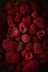 raspberries on black