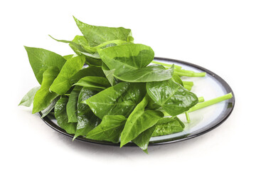 Fresh Green Leafy Vegetables on Black Plate - Healthy Cooking Ingredients