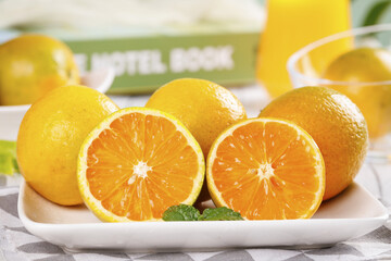 Fresh Sweet Oranges from Lianjiang Guangxi China with Juice Glass - Healthy Citrus Fruit Display