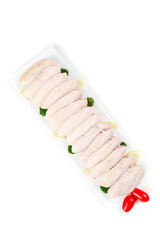 Raw Fresh Chicken Wings on White Tray with Herbs and Peppers Ready for Cooking