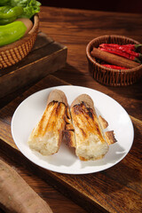 Roasted Sweet Potatoes with White Flesh on Rustic Wooden Table Kitchen Scene