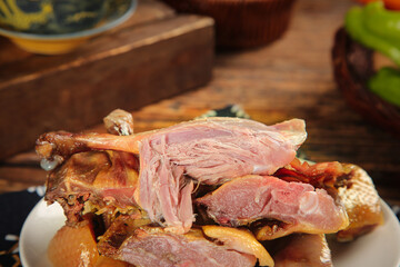 Air-dried Whole Duck Traditional Farmers Preparation with Rich Flavor on Rustic Wooden Table