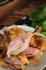 Handmade Farmhouse Air-Dried Whole Duck Meat Slices with Rich Flavor on Rustic Wooden Table