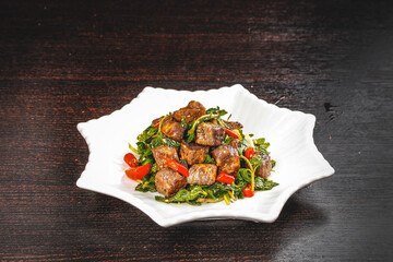 Diced Australian Pure Beef Cubes with Fresh Vegetables on White Plate