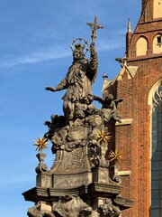 Cathedral in Wroclaw, Poland with statue in front of it 