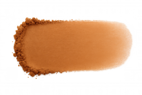 Orange powder makeup spreading across transparent surface, showing rough-edged texture and vibrant cosmetic pigmentation