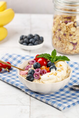 Healthy Oatmeal Breakfast Bowl with Yogurt Fresh Berries and Banana Slices Morning Nutrition