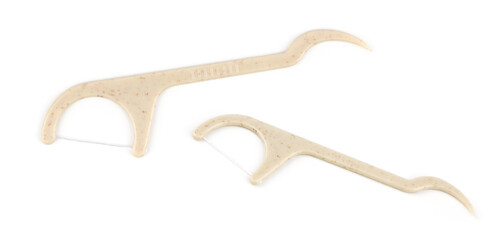 Eco friendly corn starch dental toothpick with dental floss on white background