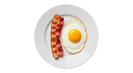Isolated Breakfast delight of crispy bacon and sunny-side-up egg on a plate in studio shot