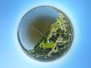 "Tiny Planet" Drone view of RE Olds Park and Pier in Oldsmar, Florida