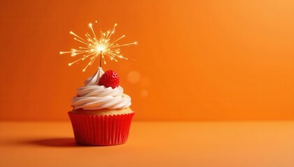Miniature cupcake with a celebratory sparkler, orange setting, homemade, colorful