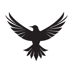 Fototapeta premium A stark black silhouette of a bird, possibly a raven or crow, with its wings fully extended in a dynamic flight pose