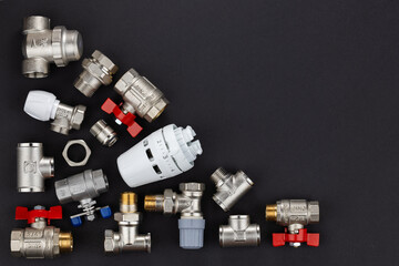 water ball valve with connecting fitting, on dark background