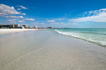 A stunning view of Siesta Key beach in Sarasota, Florida, famous for its pure white sands.