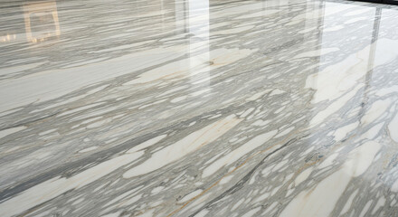 Polished marble surface with natural veining and reflections