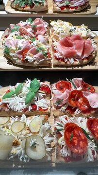 Baguette sandwich with cheese, ham, tomatoes and vegetables