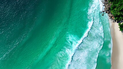 A breathtaking view of the turquoise waters and sandy beach of Seychelles, showcasing the natural beauty of the island.