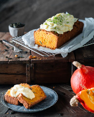 Pumpkin bread loaf with cream cheese frosting