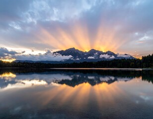Fototapeta premium Sunrise over a serene lake reflecting a mountain range
